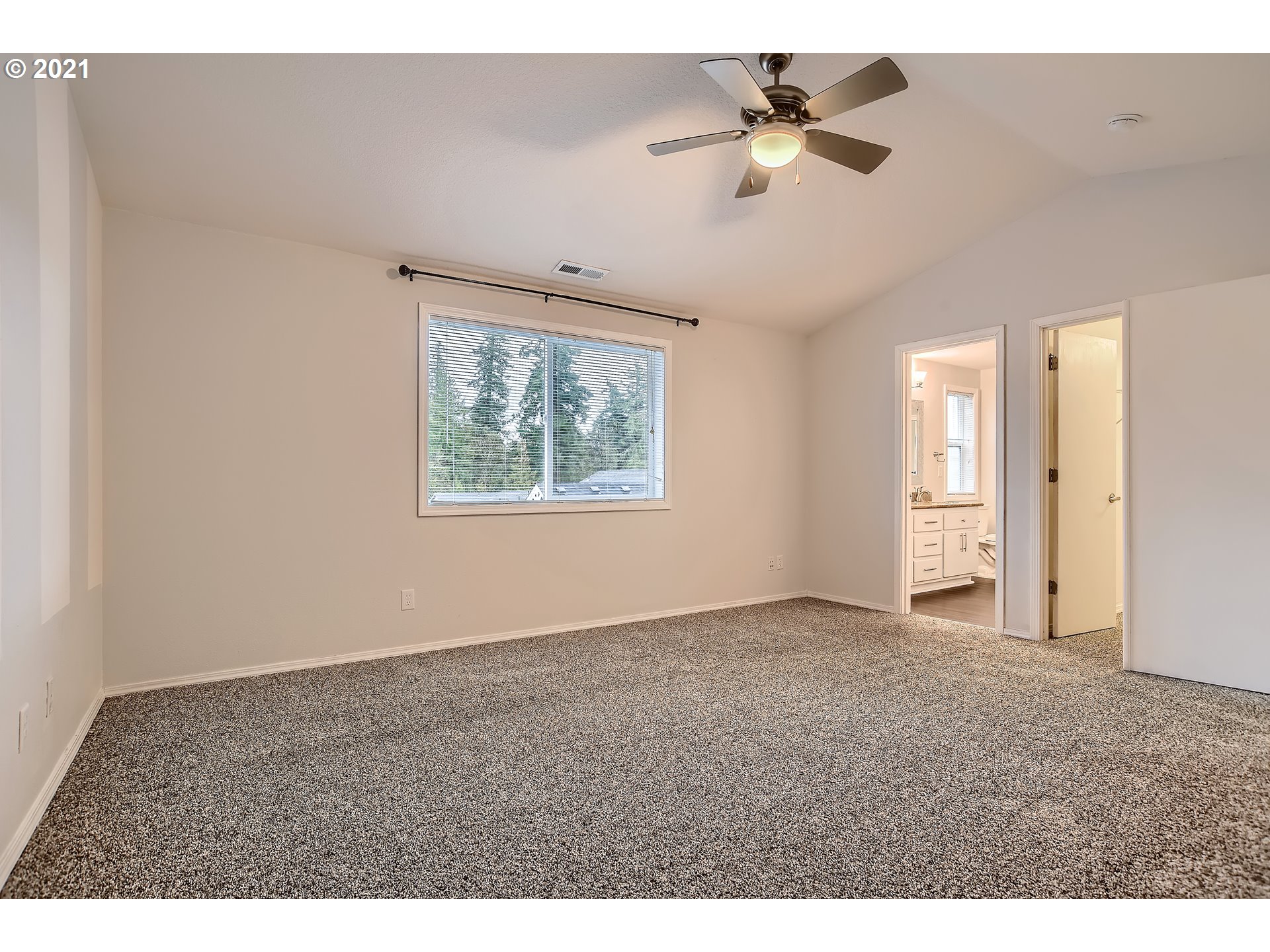 14540 Southeast Marci Way Clackamas, OR 97015 - Photo 17 of 32 a view of an empty room with a ceiling fan