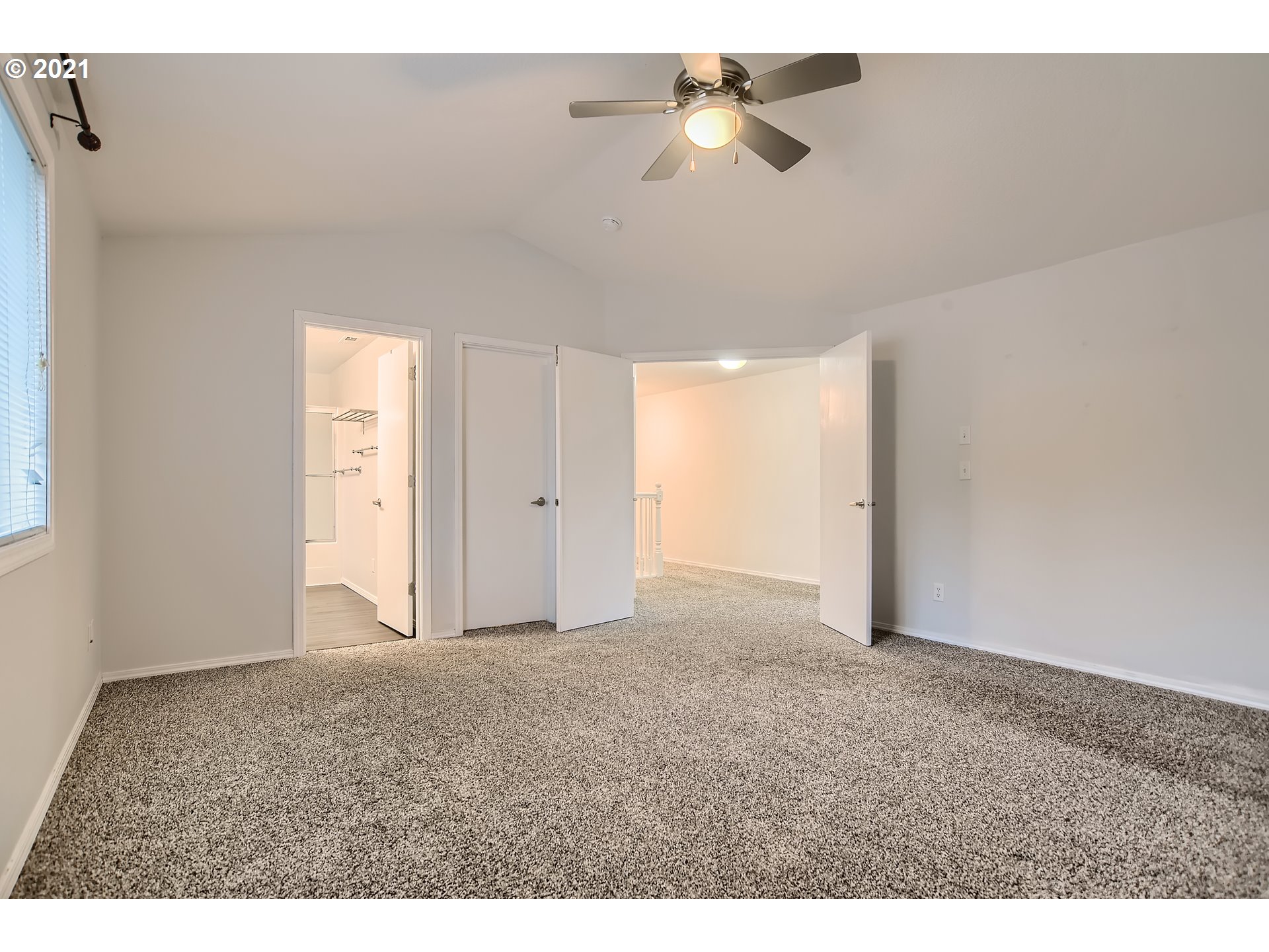 14540 Southeast Marci Way Clackamas, OR 97015 - Photo 19 of 32 a view of an empty room and a ceiling fan