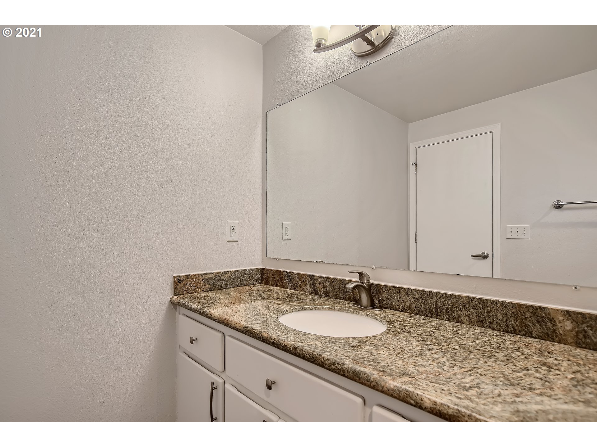 14540 Southeast Marci Way Clackamas, OR 97015 - Photo 23 of 32 a bathroom with a granite countertop sink and a mirror