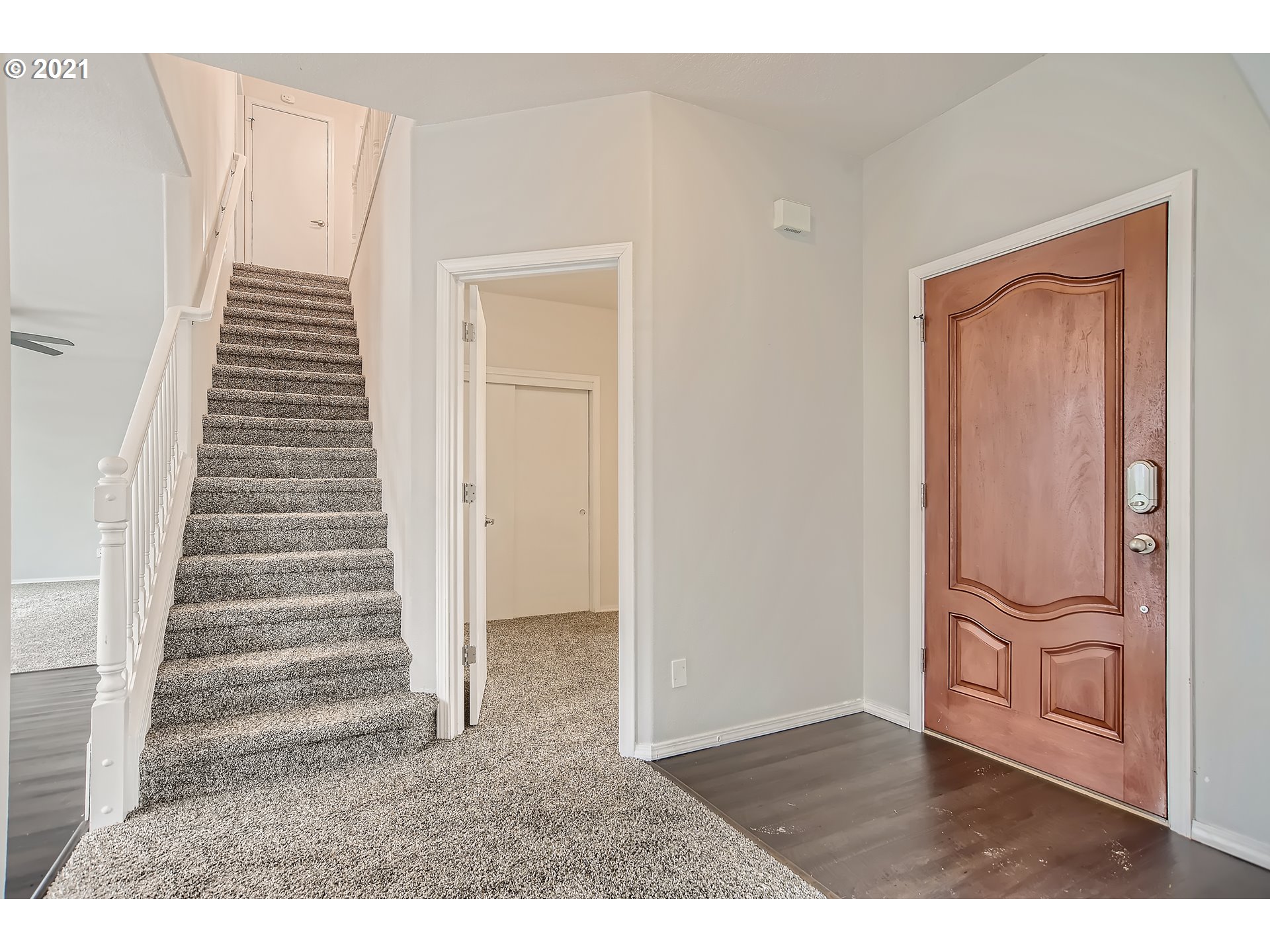 14540 Southeast Marci Way Clackamas, OR 97015 - Photo 4 of 32 a view of an entryway with wooden floor