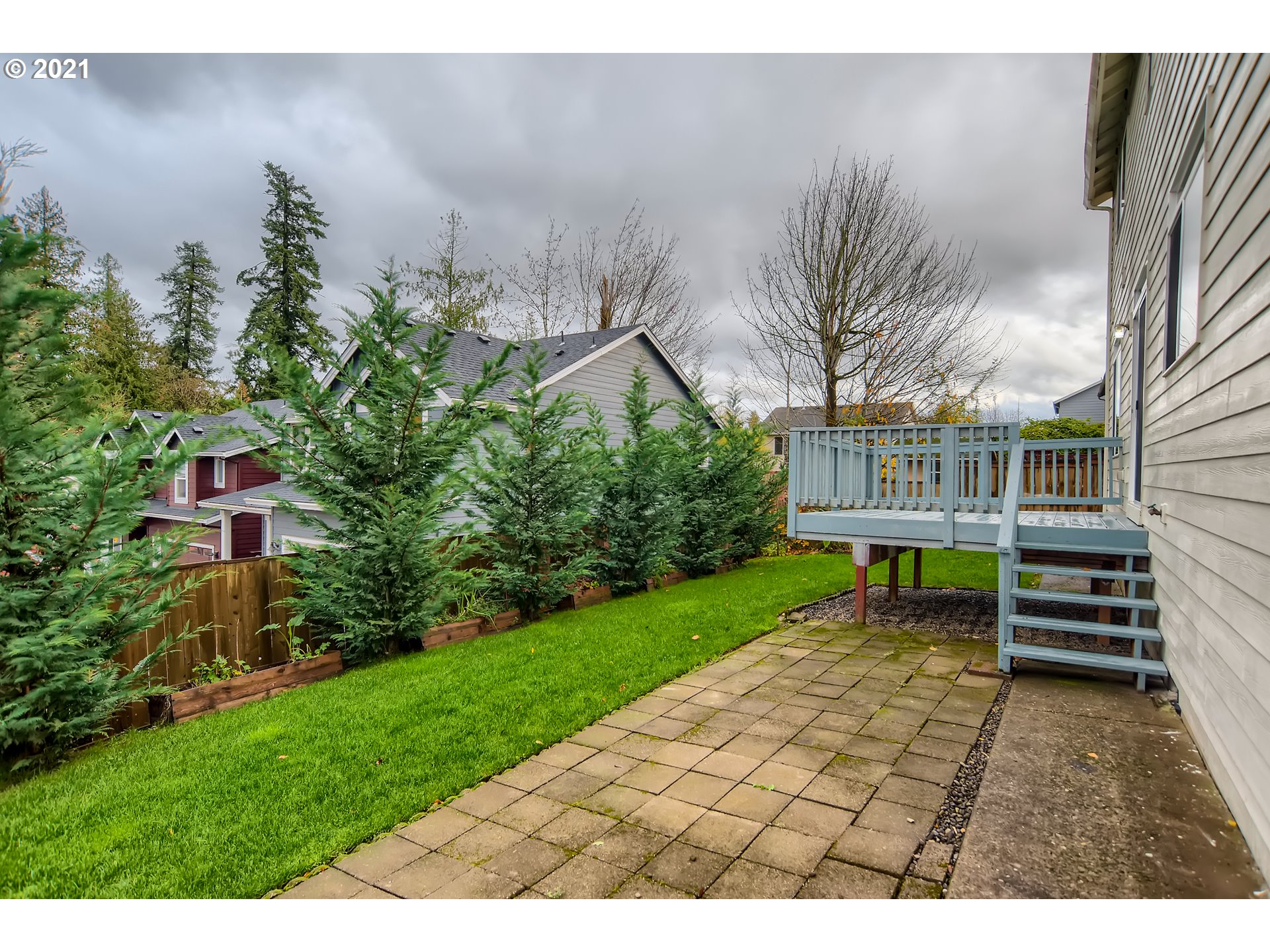 14540 Southeast Marci Way Clackamas, OR 97015 - Photo 31 of 32 a view of a house with a yard and sitting area