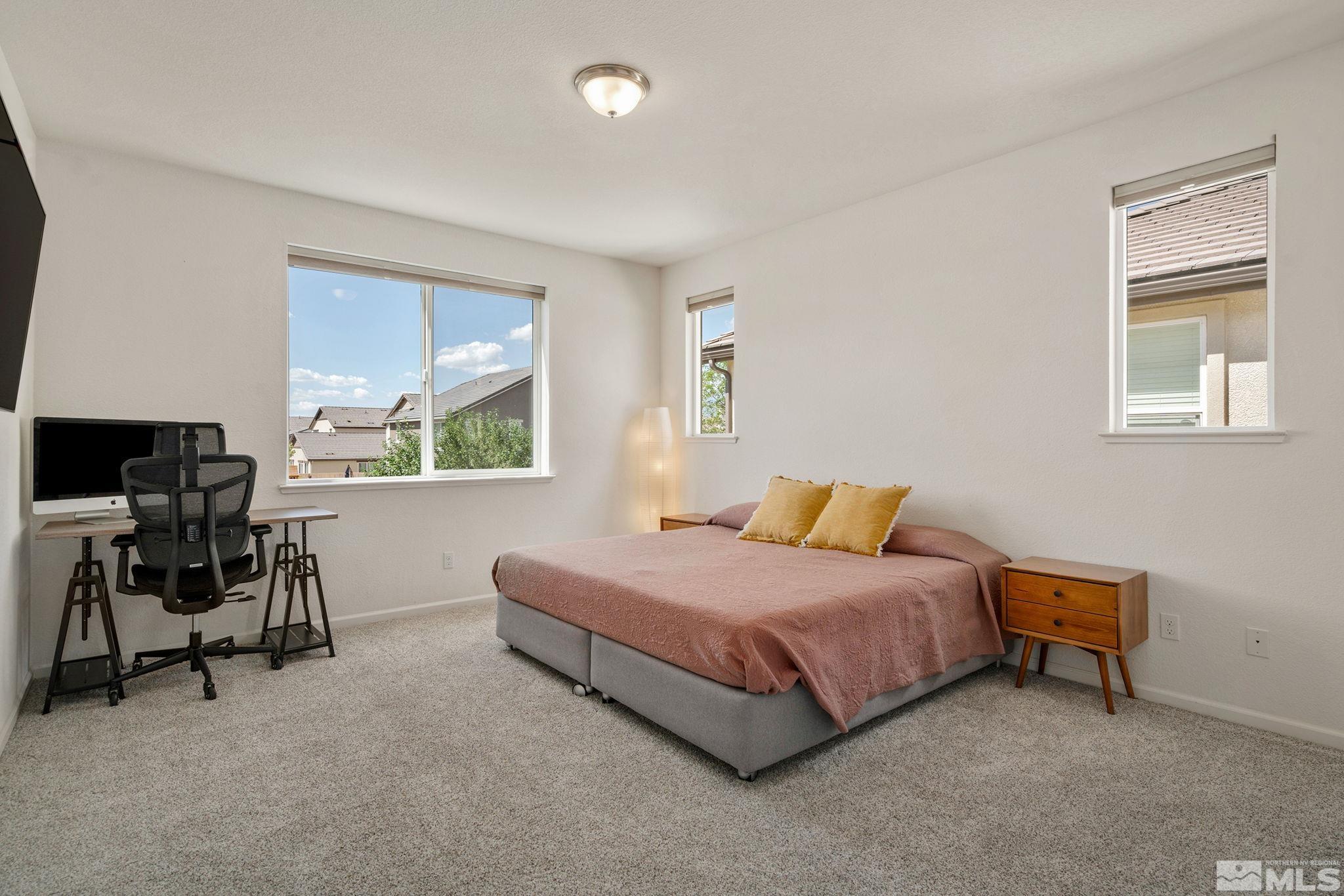 1950 Hope Valley Drive Reno, NV 89521 - Photo 16 of 32 a living room with a bed furniture and a window