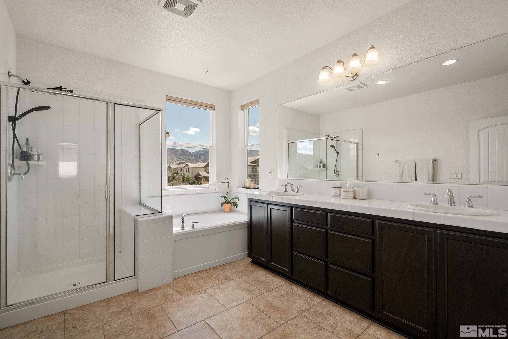1950 Hope Valley Drive Reno, NV 89521 - Photo 18 of 32 a large bathroom with a double vanity sink mirror and double