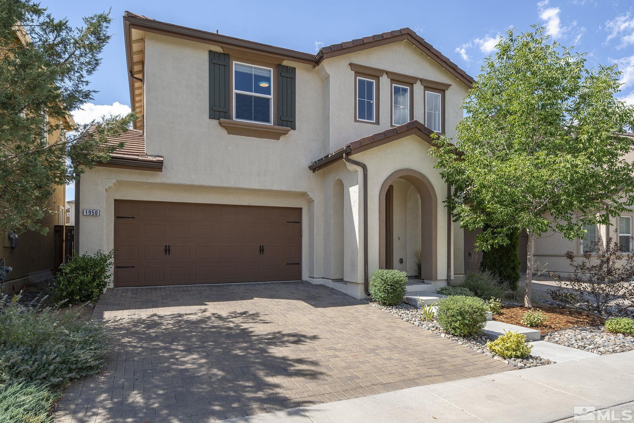 1950 Hope Valley Drive Reno, NV 89521 - Photo 2 of 32 a front view of a house with garden