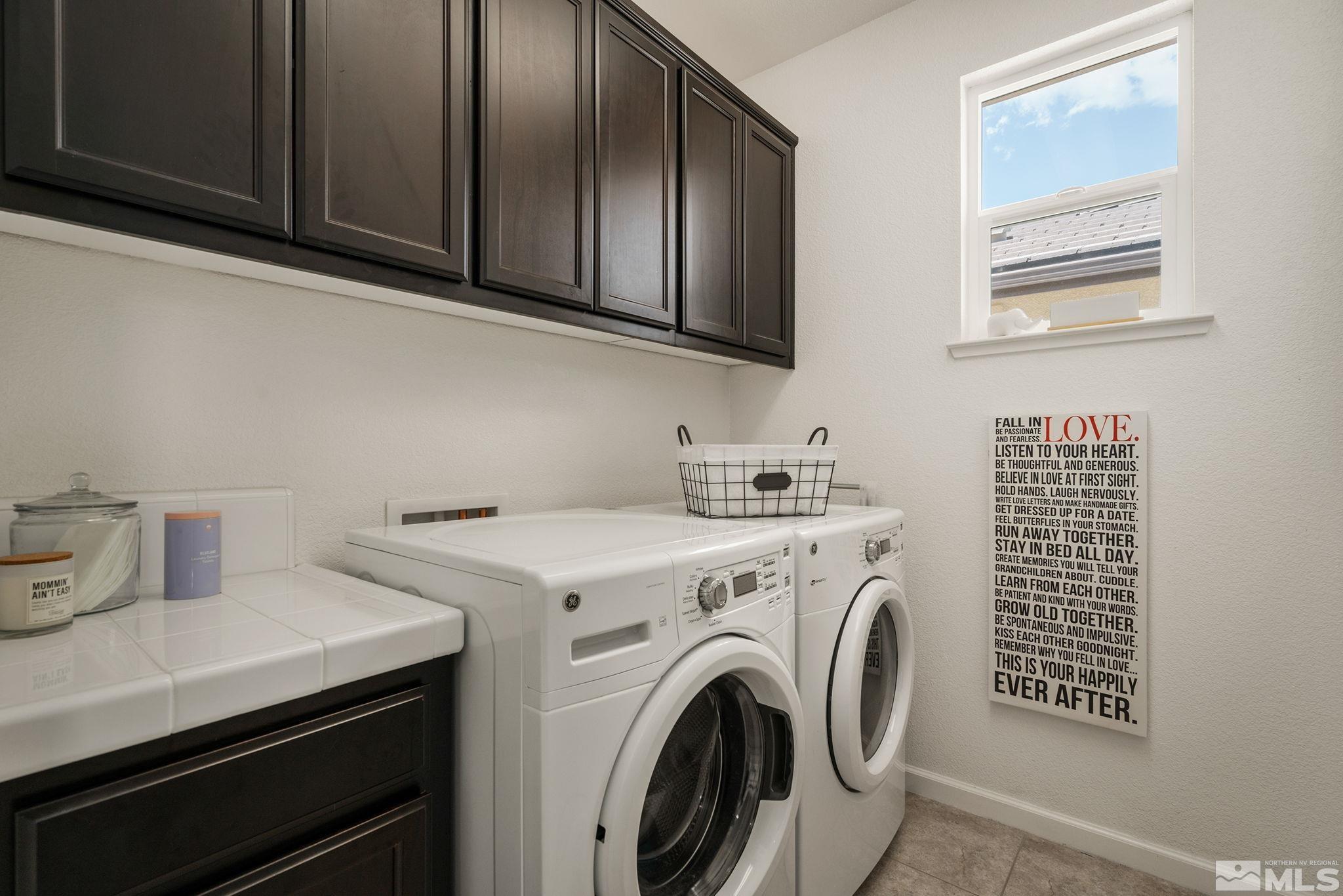 1950 Hope Valley Drive Reno, NV 89521 - Photo 23 of 32 a utility room with dryer and washer