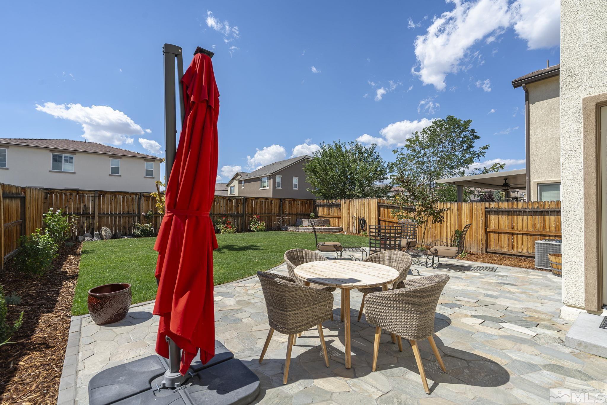 1950 Hope Valley Drive Reno, NV 89521 - Photo 25 of 32 a view of a patio with a table and chairs