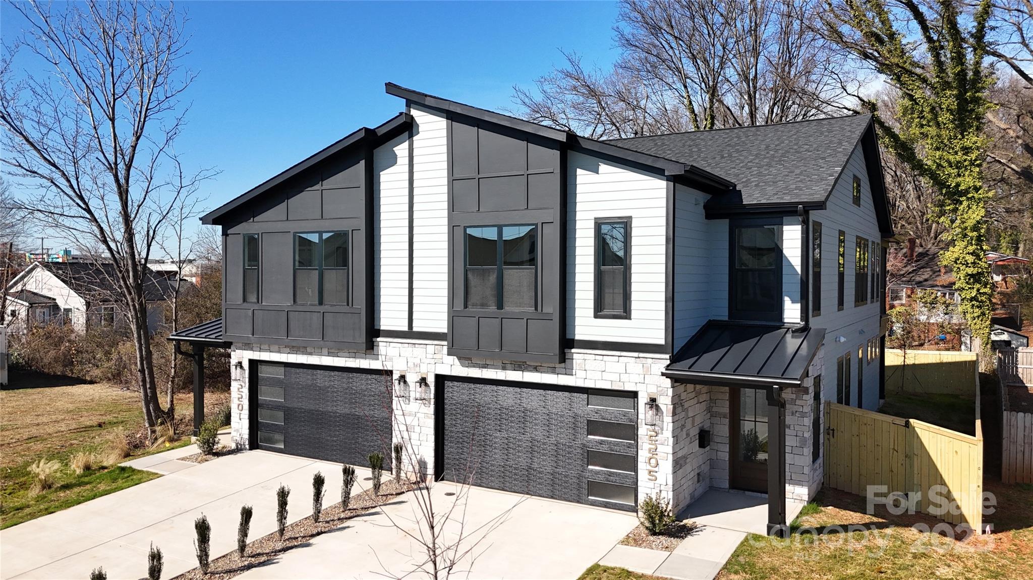 2205 Catalina Avenue Charlotte, NC 28206 - Photo 1 of 38 a view of a house with a wooden fence