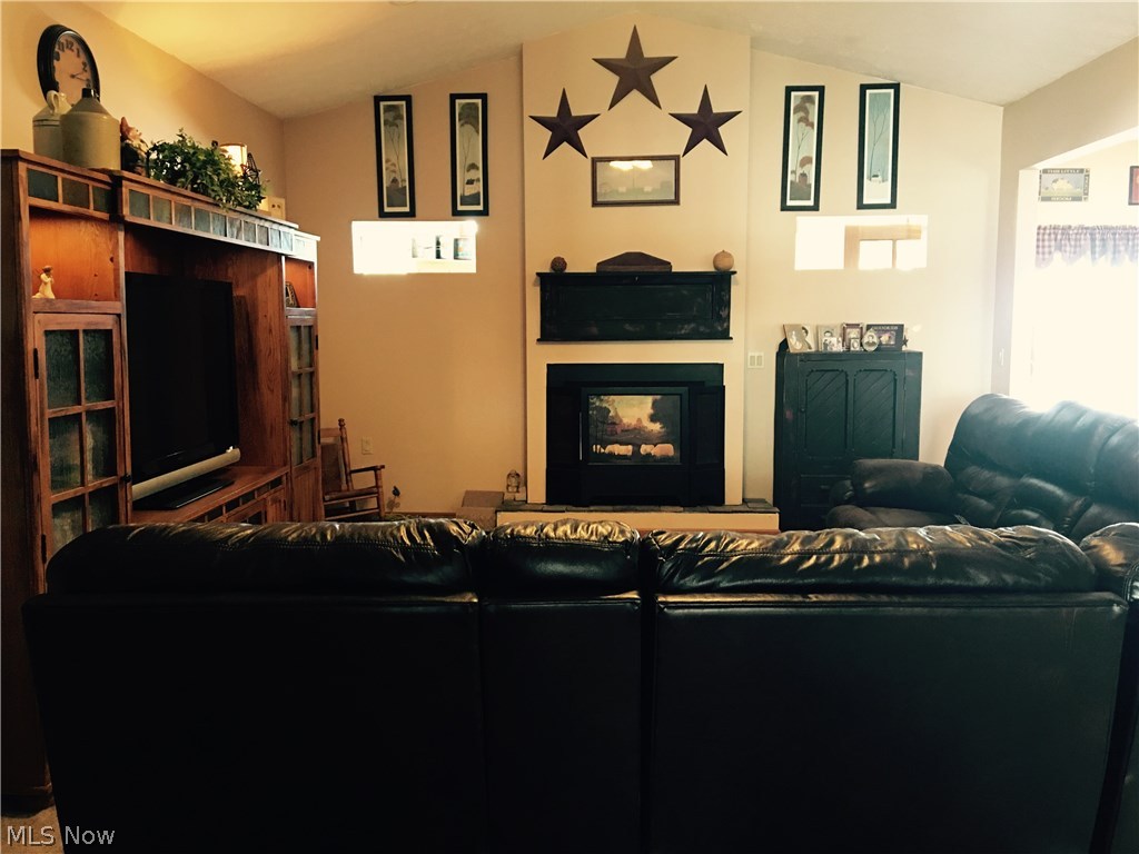 Great room with cathedral ceiling and gas fireplace