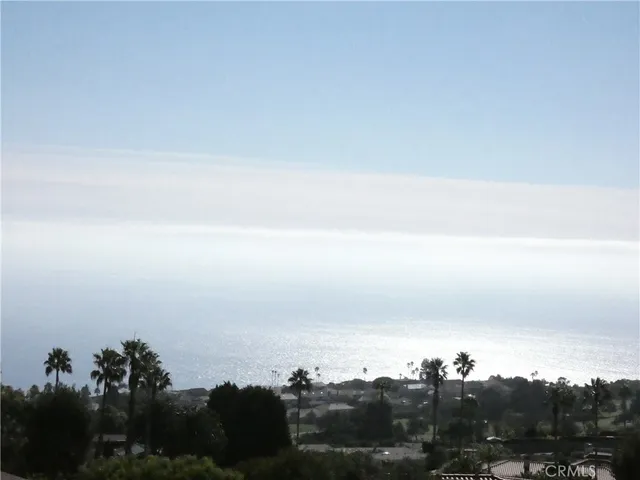 a view of ocean and sunset