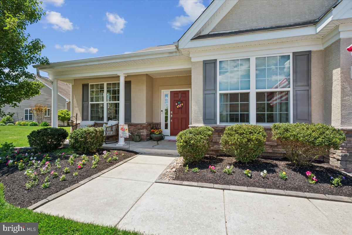 20 Montclaire Road Medford, NJ 08055 - Photo 4 of 34 Charming entryway with vibrant blooms.