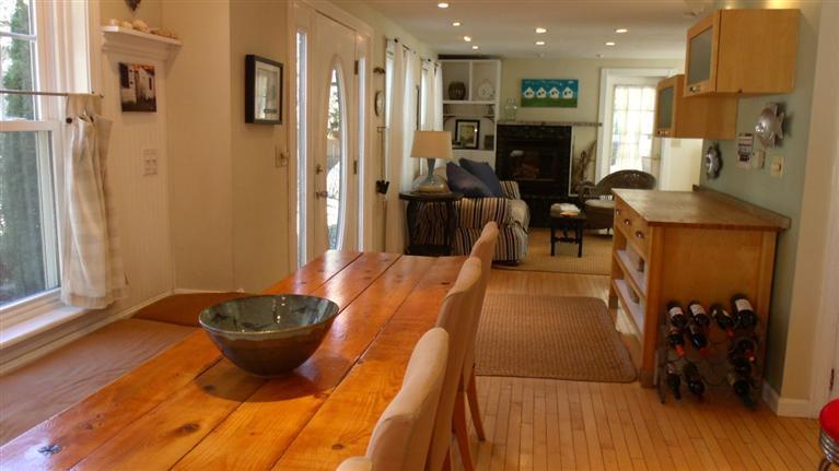72 Shore Road Truro, MA 02666 - Photo 8 of 15 a living room with lots of furniture and a wooden floor