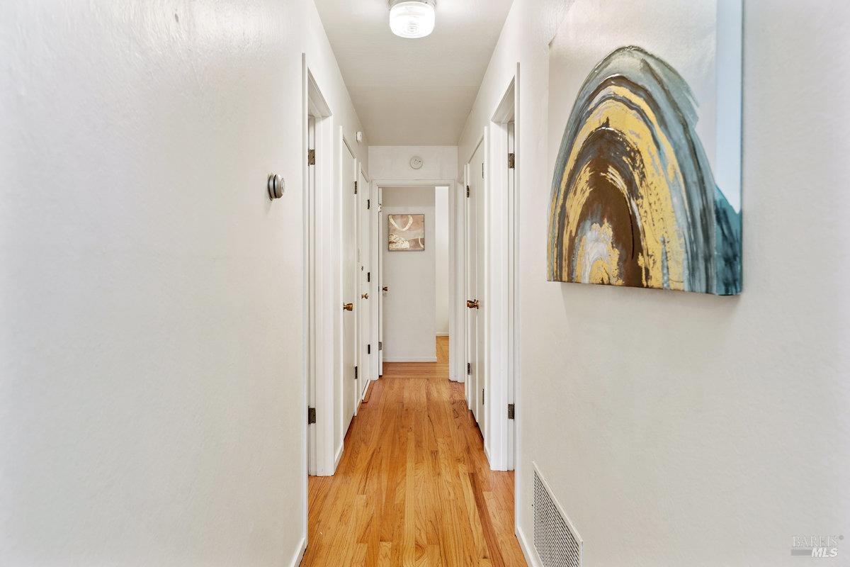 29 Locust Avenue Mill Valley, CA 94941 - Photo 10 of 26 a view of a bathroom with a vanity and a mirror