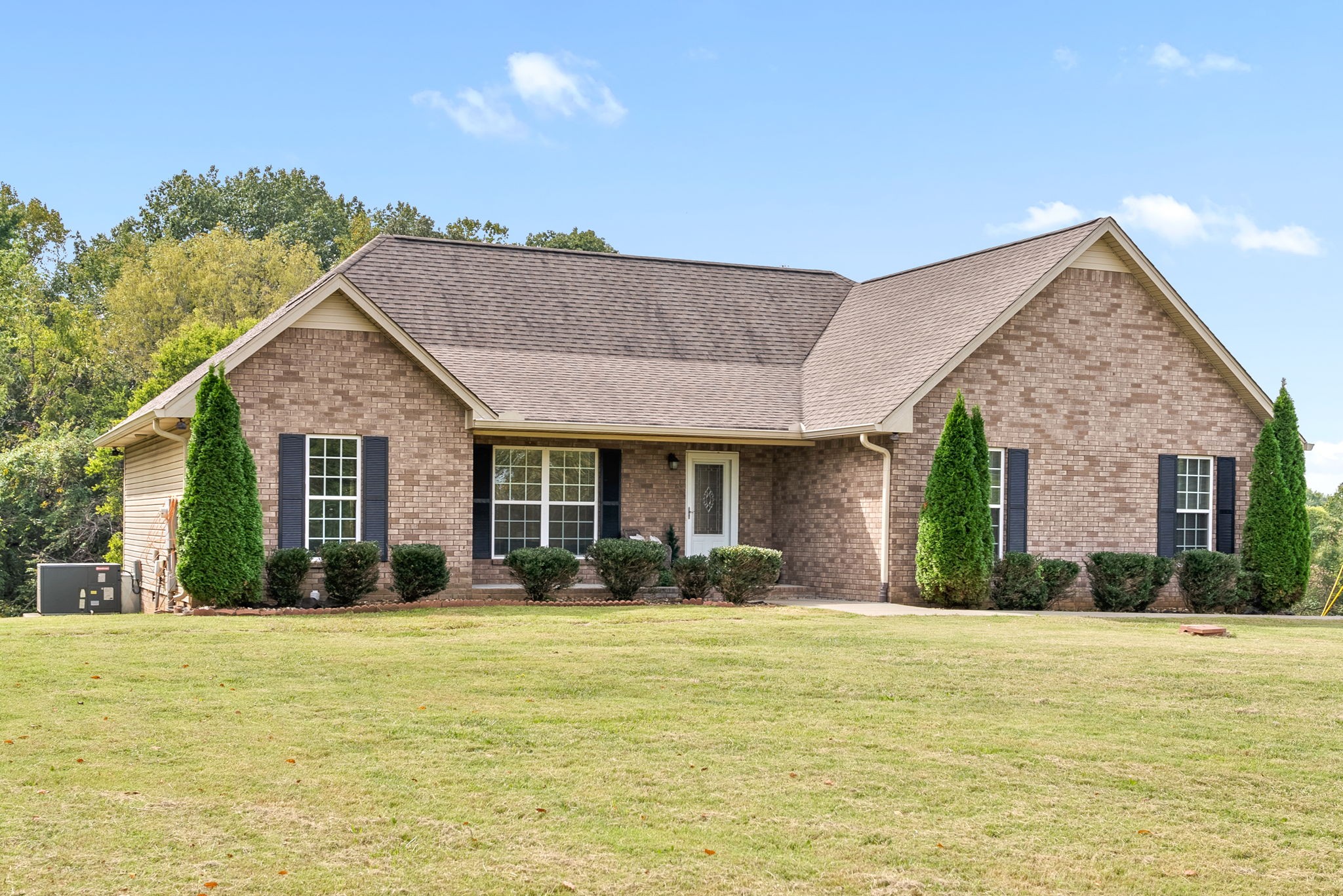 1105 Pleasant Valley Road Chapmansboro, TN 37035 - Photo 2 of 30 a front view of house with yard and green space
