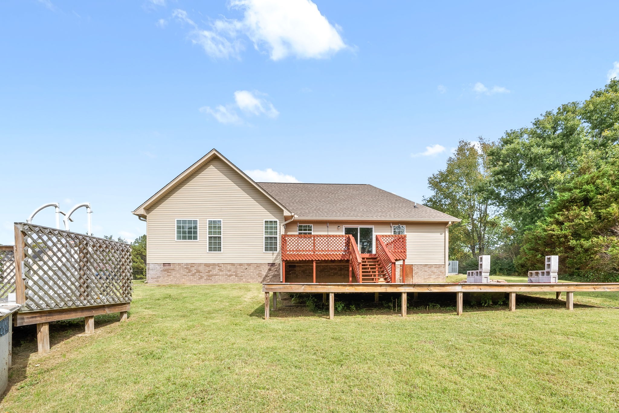 1105 Pleasant Valley Road Chapmansboro, TN 37035 - Photo 24 of 30 a view of a house with pool and chairs