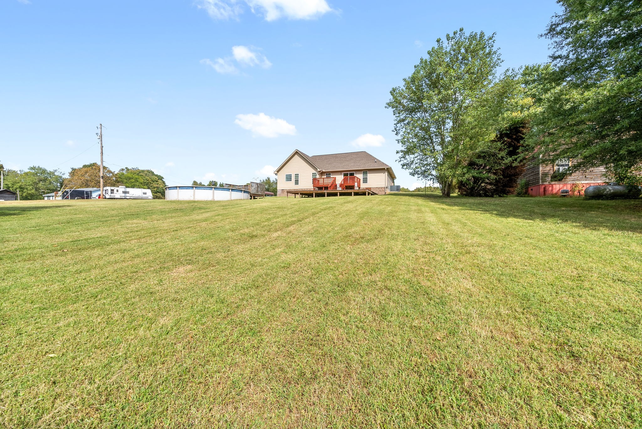 1105 Pleasant Valley Road Chapmansboro, TN 37035 - Photo 29 of 30 a view of a large garden with plants and large trees