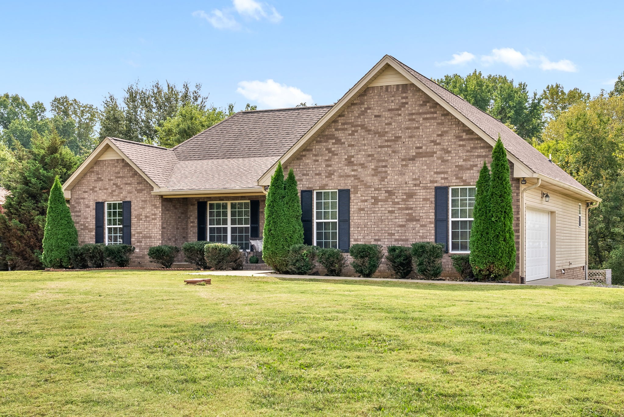 1105 Pleasant Valley Road Chapmansboro, TN 37035 - Photo 30 of 30 a front view of a house with a yard
