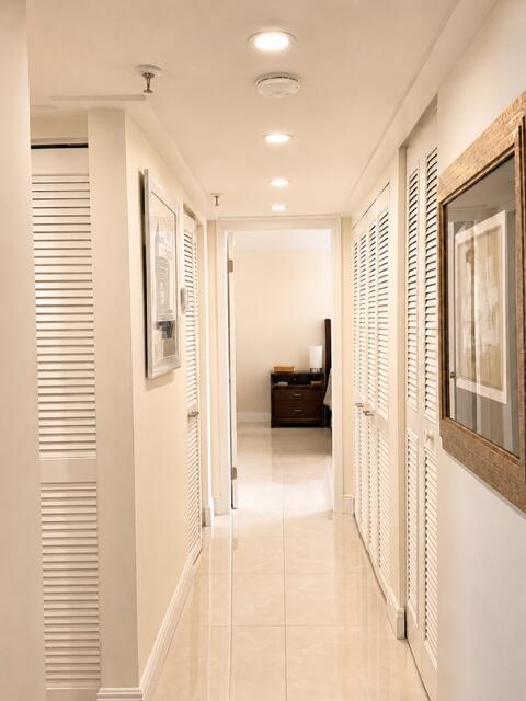 7170 Promenade Drive, Unit 101 Boca Raton, FL 33433 - Photo 14 of 30 Hall to Bedrooms