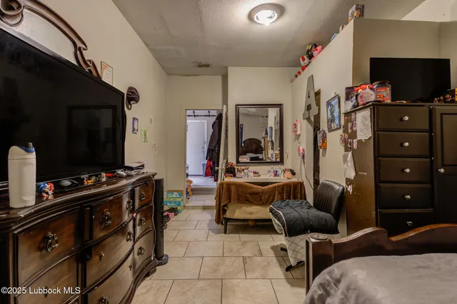 a room with furniture and a flat screen tv