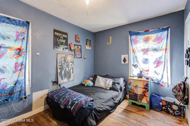 a bedroom with a bed and furniture