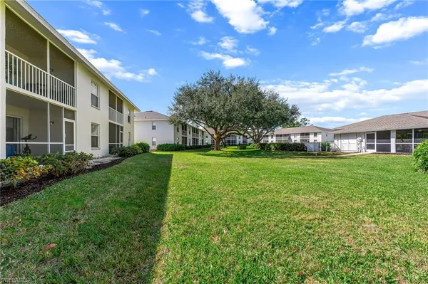 a view of house with garden