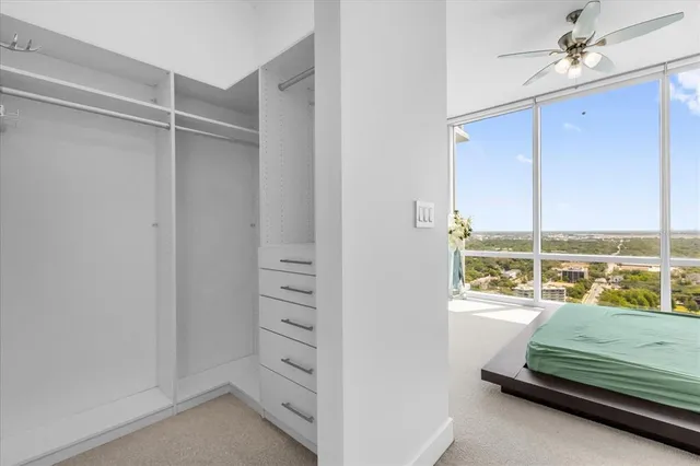 a view of room with furniture and a rug