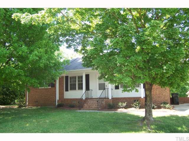 4905 Waterbury Road Raleigh, NC 27604 - Photo 1 of 12 a view of a house with backyard and a tree