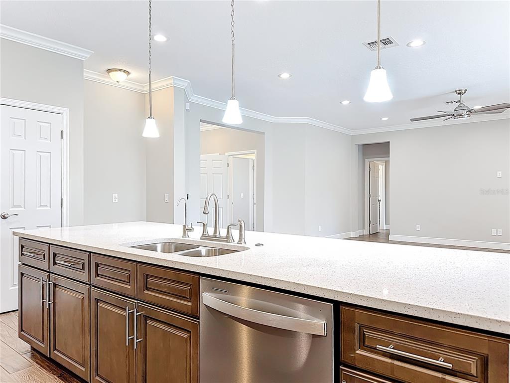 19424 Oakleaf Street Orlando, FL 32833 - Photo 13 of 43 a bathroom with a sink a large mirror and a shower