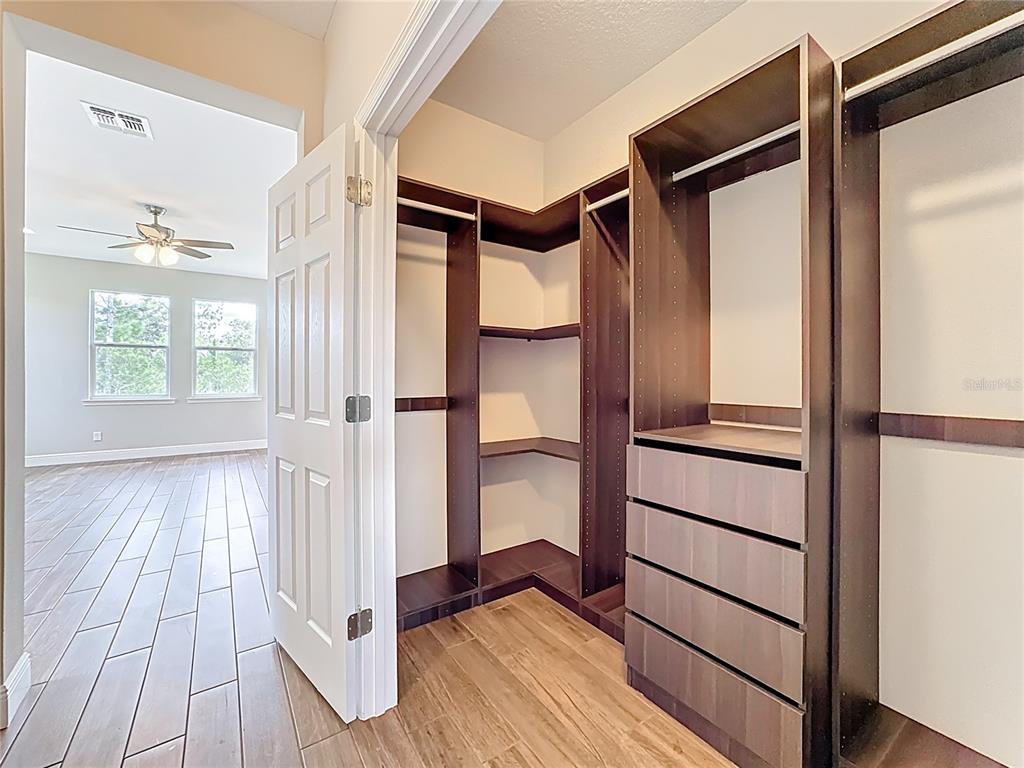 19424 Oakleaf Street Orlando, FL 32833 - Photo 25 of 43 a view of an entryway with wooden floor and door