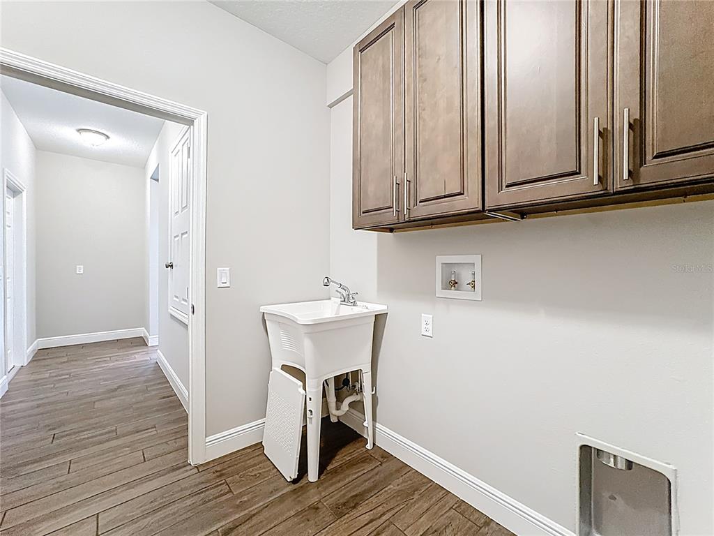19424 Oakleaf Street Orlando, FL 32833 - Photo 36 of 43 a view of entryway with wooden floor