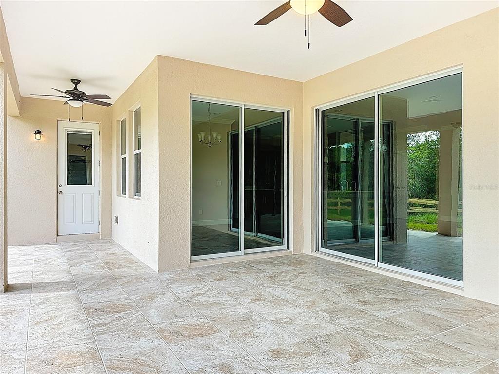 19424 Oakleaf Street Orlando, FL 32833 - Photo 39 of 43 a view of a house with a porch