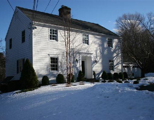 25 Tanglewood Court Ridgefield, CT 06877 - Photo 1 of 1 a front view of a house with a yard
