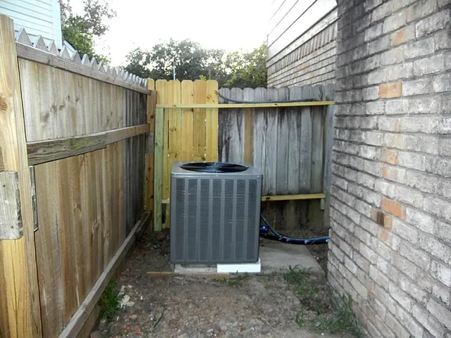 a view of a wooden fence