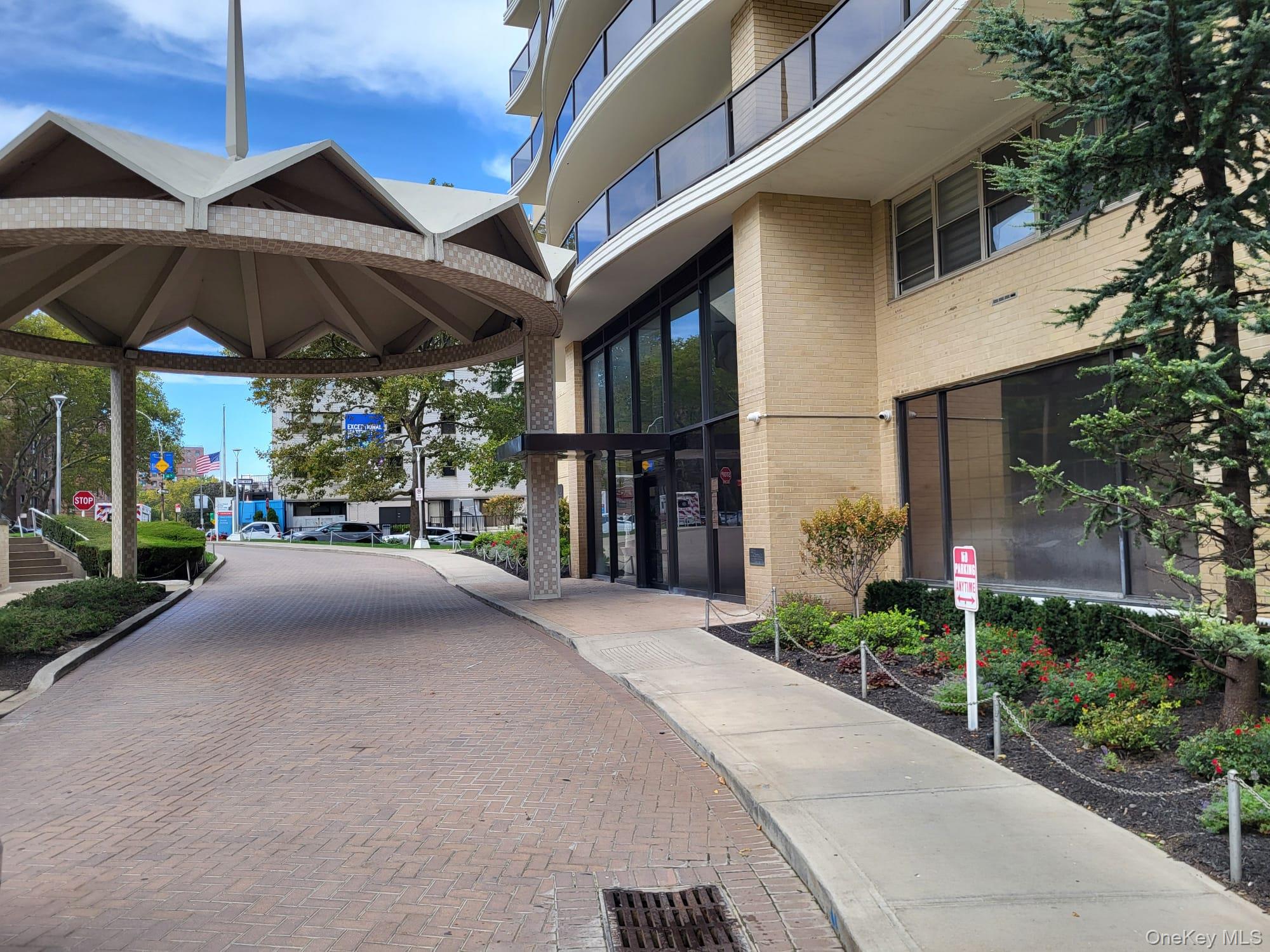 a view of street with sitting area