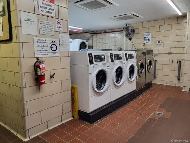 a view of a terrace with chairs and a table
