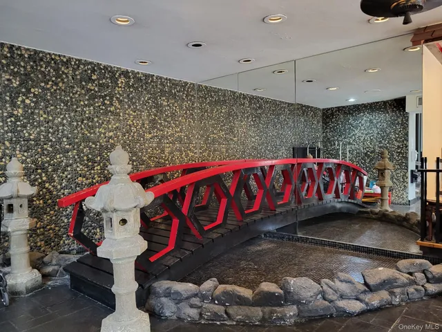 a blue sign that is in front of a building