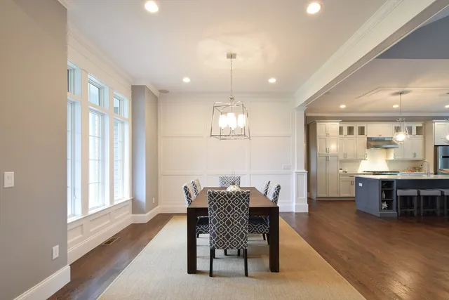 a view of a dining room with furniture and window