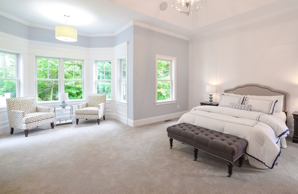 3 B Johnnies Way Rehoboth, MA 02769 - Photo 6 of 9 a bedroom with a bed and a couch with outer view