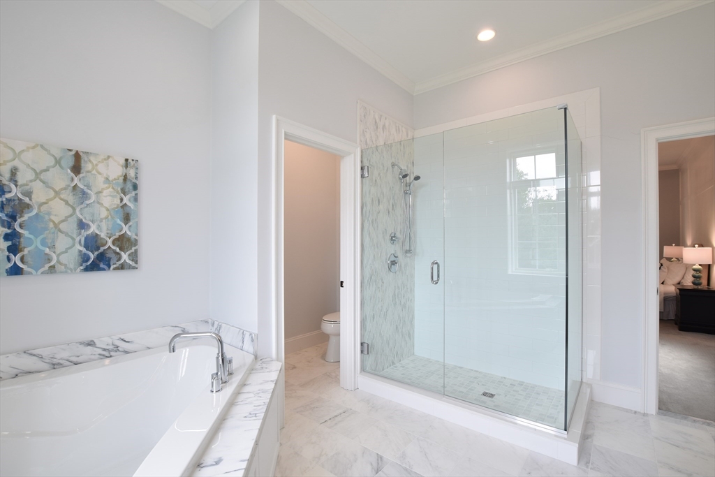 3 B Johnnies Way Rehoboth, MA 02769 - Photo 7 of 9 a bathroom with a tub sink and shower