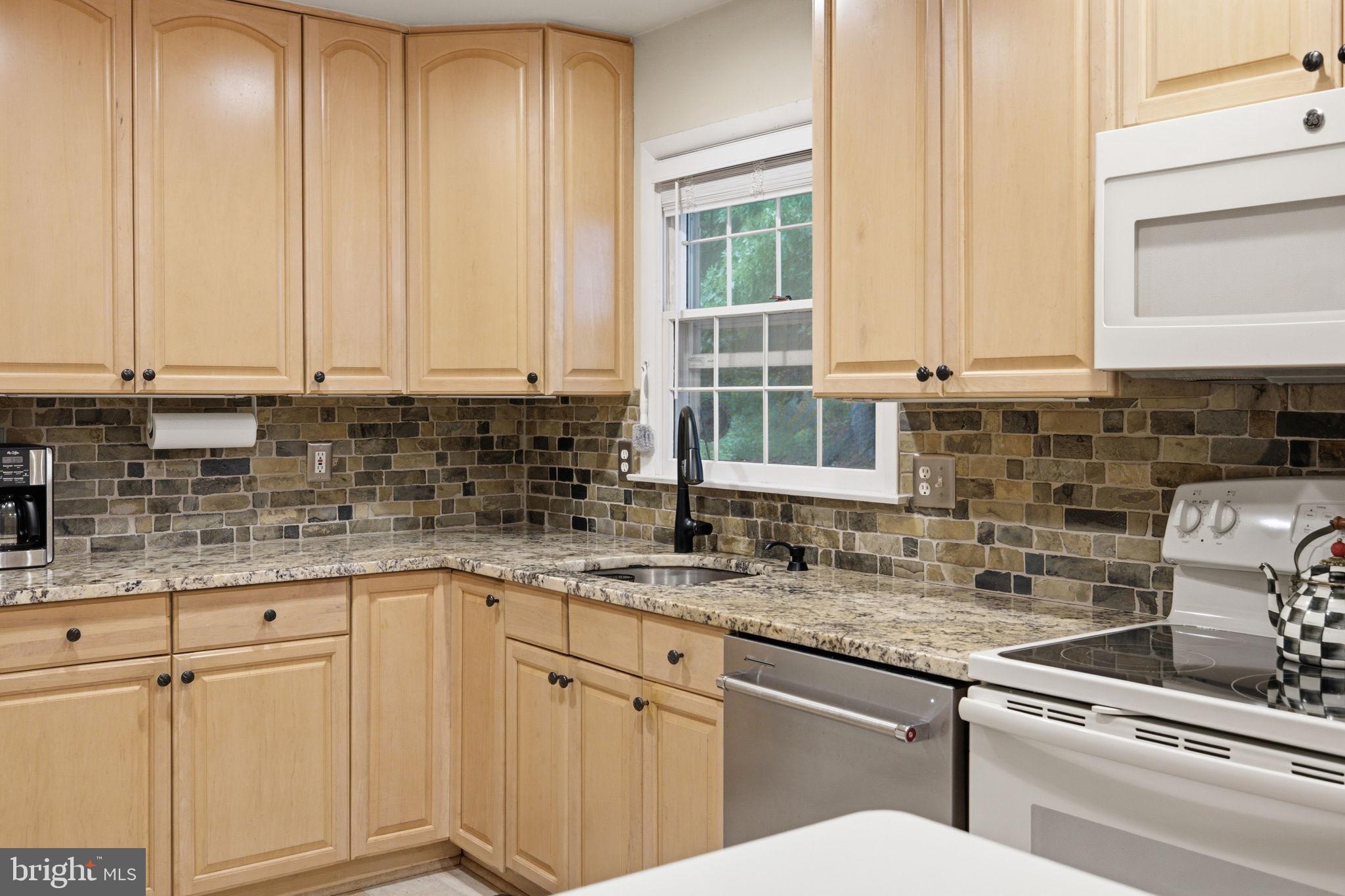 11937 Bayswater Road Gaithersburg, MD 20878 - Photo 15 of 55 Charming kitchen with modern finishes.