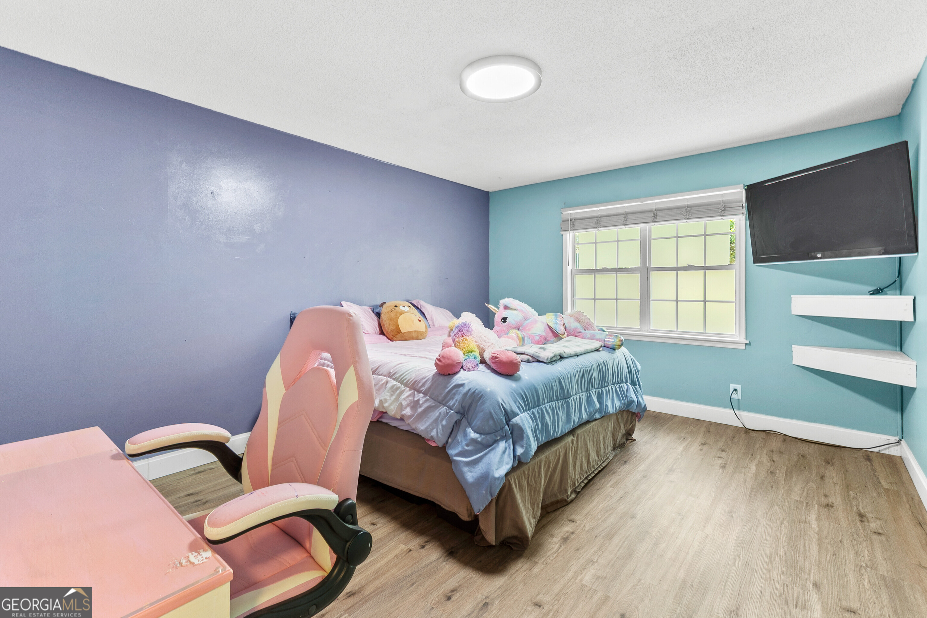 285 Edgewater Drive Macon, GA 31220 - Photo 27 of 66 a bedroom with a bed chair and a window