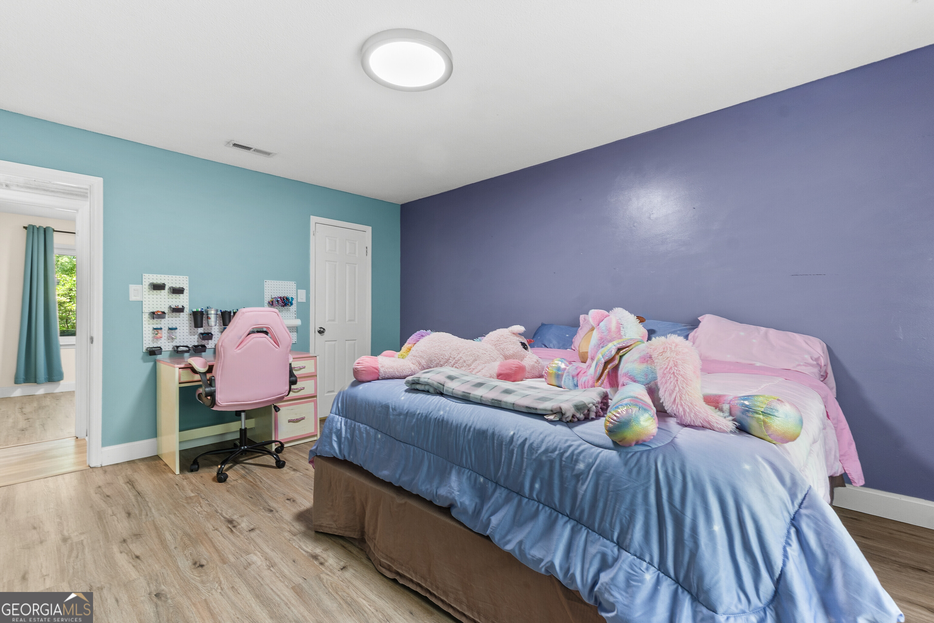 285 Edgewater Drive Macon, GA 31220 - Photo 28 of 66 a bedroom with bed and a wooden floor