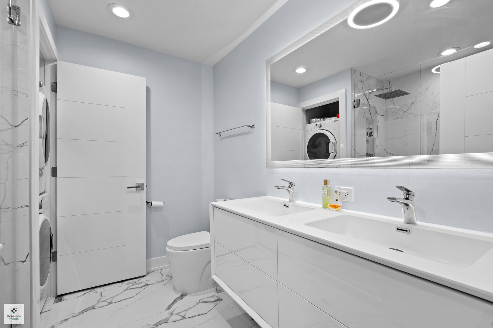 50 Lake Boulevard, Unit 632 Buffalo Grove, IL 60089 - Photo 15 of 26 a bathroom with a double vanity sink mirror and toilet