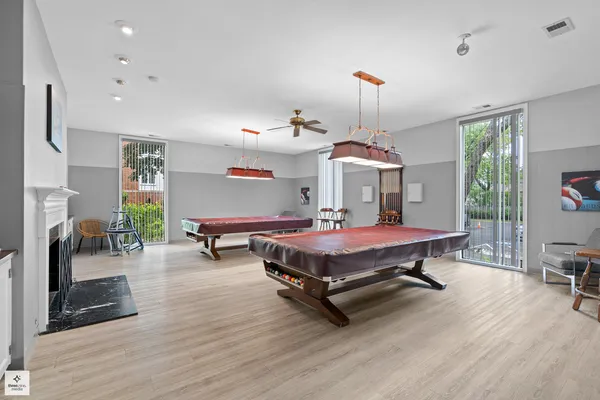 a bedroom with furniture and a chandelier