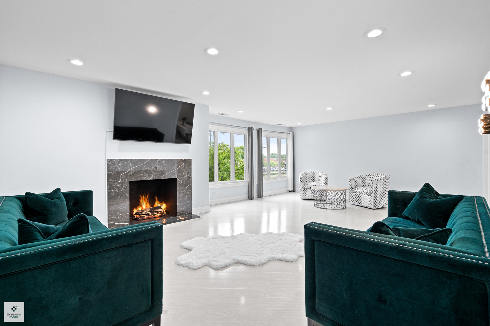 50 Lake Boulevard, Unit 632 Buffalo Grove, IL 60089 - Photo 3 of 26 a living room with furniture and a fireplace