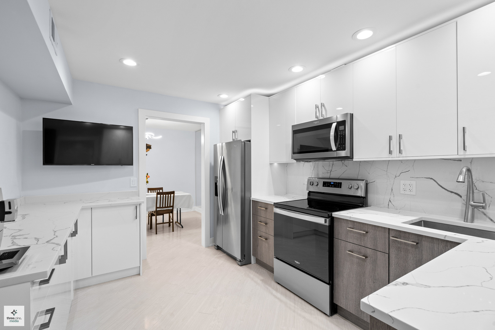 50 Lake Boulevard, Unit 632 Buffalo Grove, IL 60089 - Photo 8 of 26 a kitchen with stainless steel appliances a stove sink microwave refrigerator and cabinets