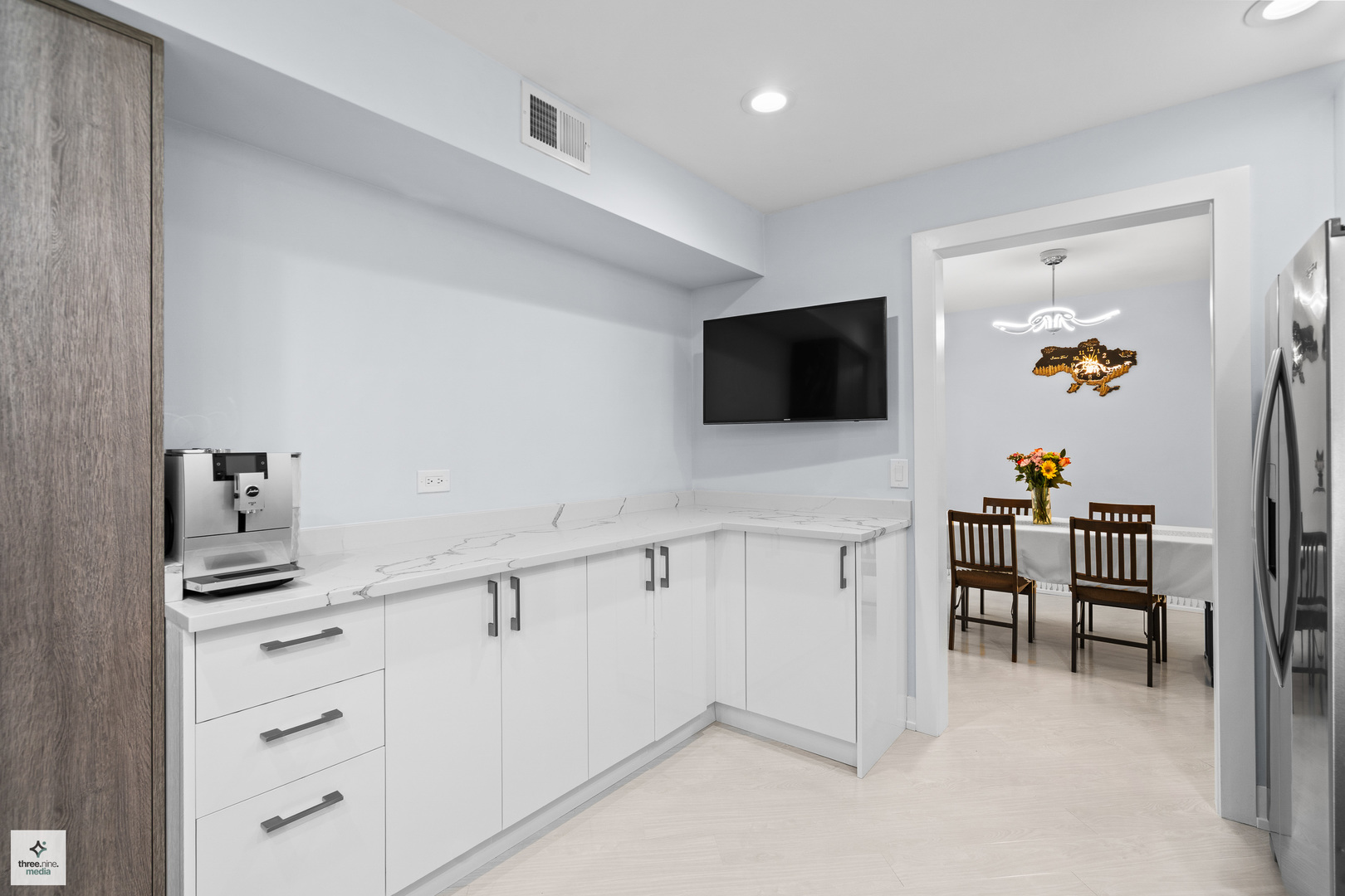 50 Lake Boulevard, Unit 632 Buffalo Grove, IL 60089 - Photo 9 of 26 a hallway with cabinets and wooden floor