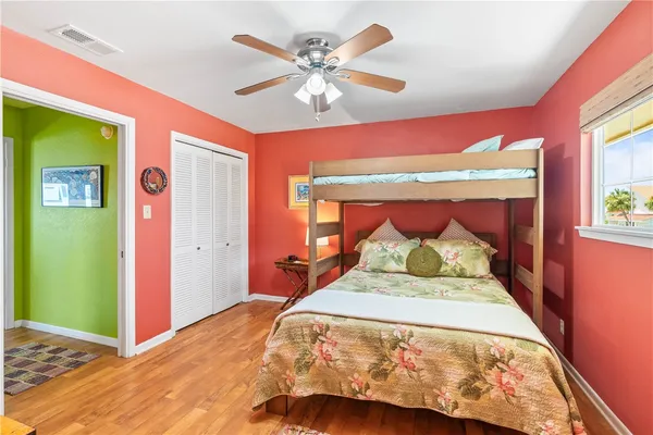 a bathroom with a sink mirror vanity and toilet
