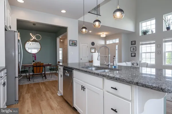 a large kitchen with a large island in it