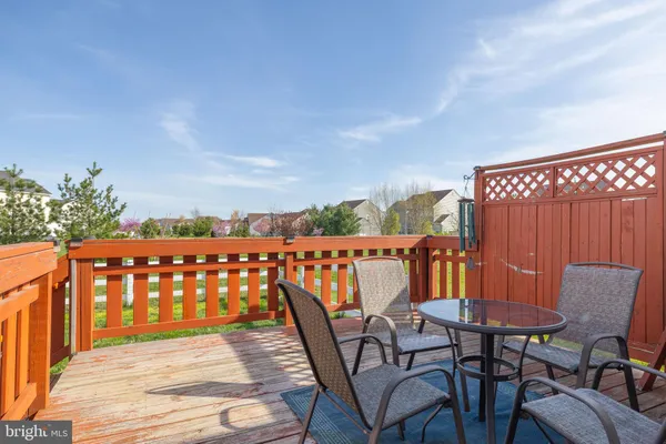 a view of swimming pool with outdoor seating and yard