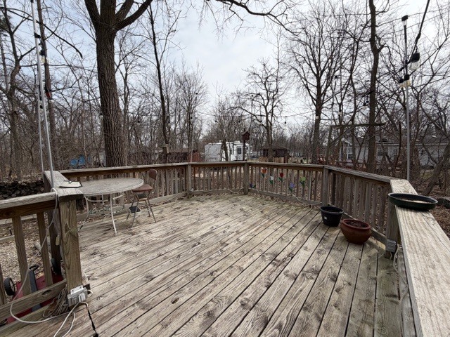 2795 East 28th Road Marseilles, IL 61341 - Photo 26 of 69 a view of deck with wooden floor and outdoor seating